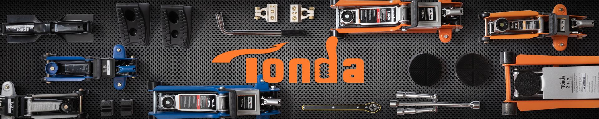 The TONDA tool wall — jacks, stands, pads and wrenches on pegboard
